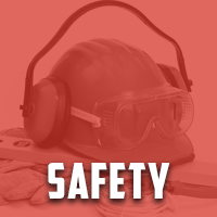 Workplace safety equipment including gloves, masks, and protective eyewear